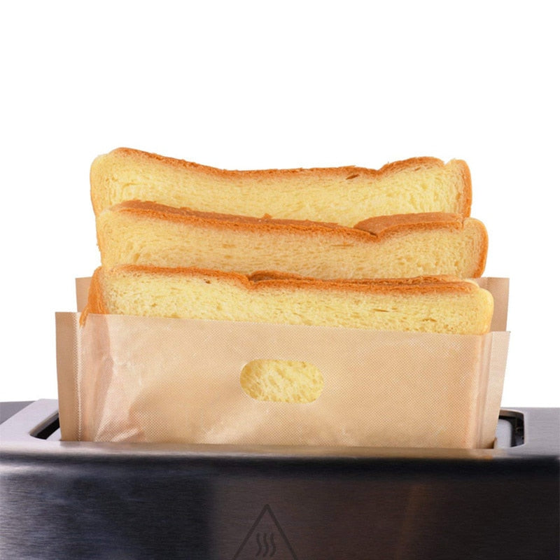 https://yoyomahalo.com/cdn/shop/products/2pcs-Toaster-Bags-for-Grilled-Cheese-Sandwiches-Made-Easy-Reusable-Non-stick-Baked-Toast-Bread-Bags_d4f7eb84-cd36-435d-af25-5195c9e36728_1200x.jpg?v=1615712065